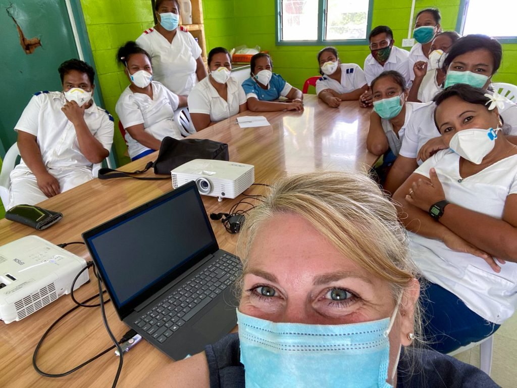 recognizing their commitment to education and opportunity,
Students, recipients of a STEM scholarship,
conducting experiments in a laboratory setting,
A poster advertising an upcoming scholarship information session with details on date,
time,Kiribati Students