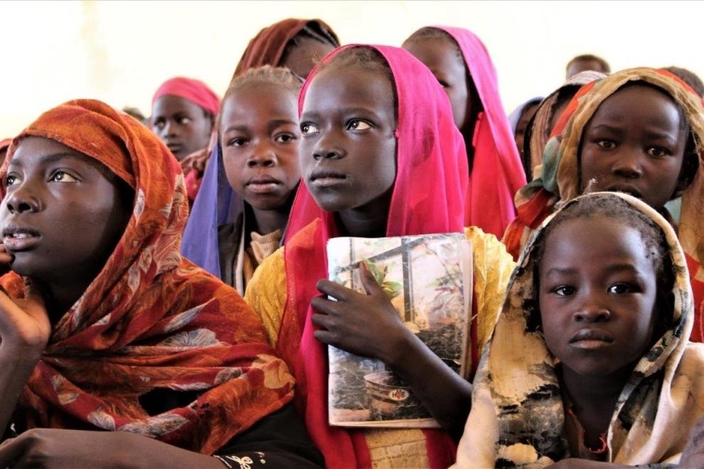 A success story featuring a scholarship alumnus who has achieved notable accomplishments in their field,
A plaque displayed in honor of scholarship contributors,
recognizing their commitment to education and opportunity,
Students, recipients of a STEM scholarship,
conducting experiments in a laboratory setting,
A poster advertising an upcoming scholarship information session with details on date, South Sudanese Students