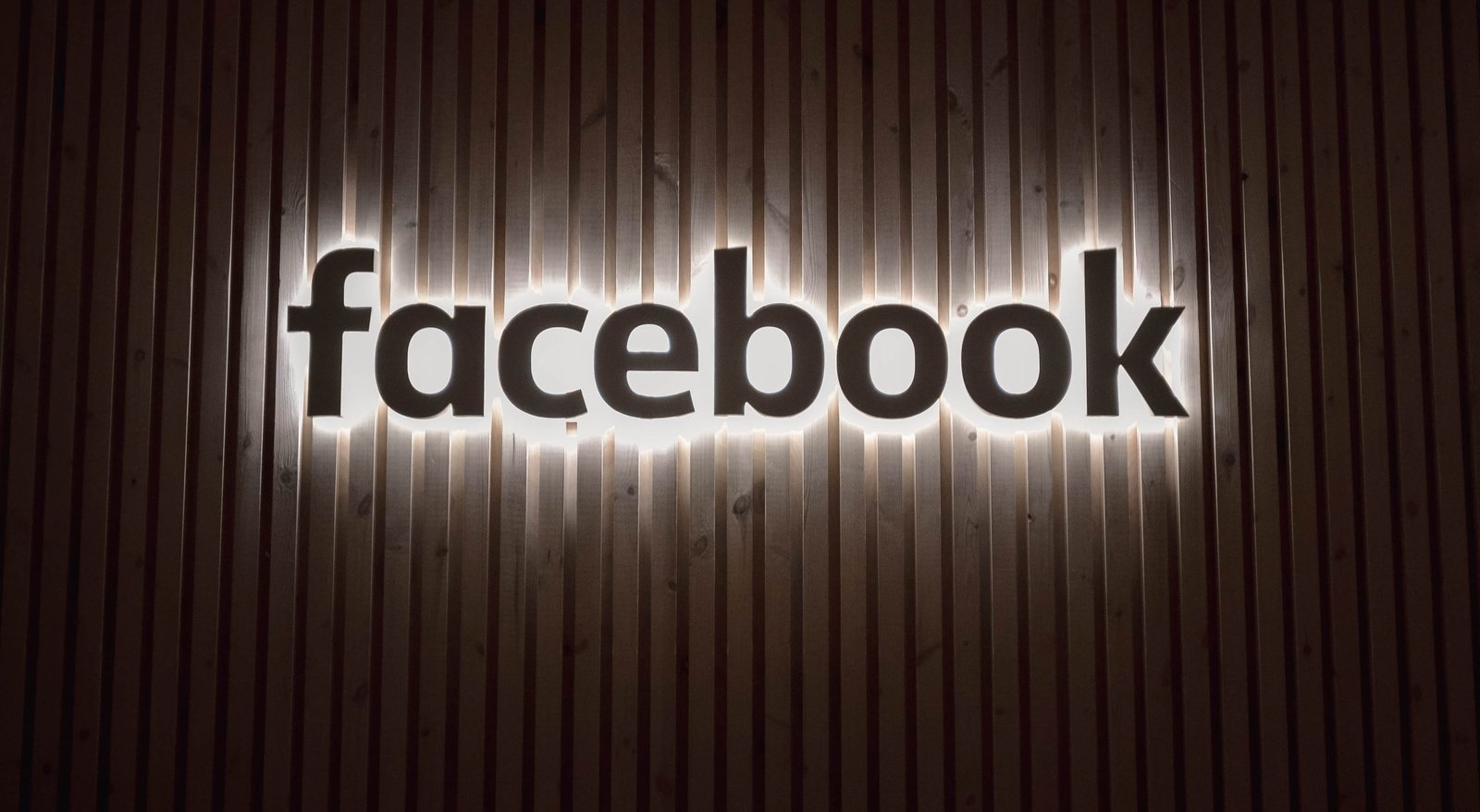 A composite image showing a Facebook logo combined with a financial graph, representing the transformation of socializing into financial success on the platform,A person pondering while looking at a computer screen, representing the curiosity of turning Facebook time into income.